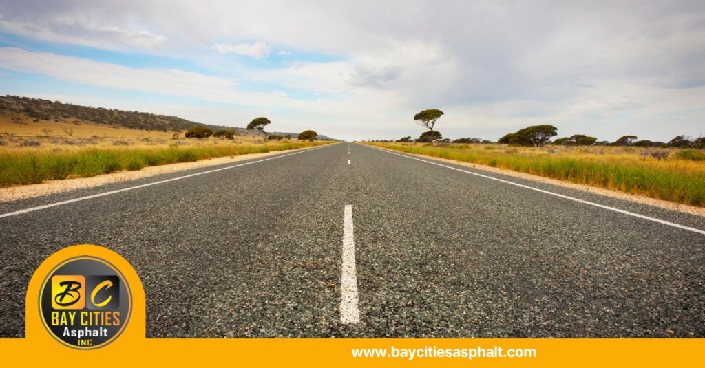 asphalt over concrete